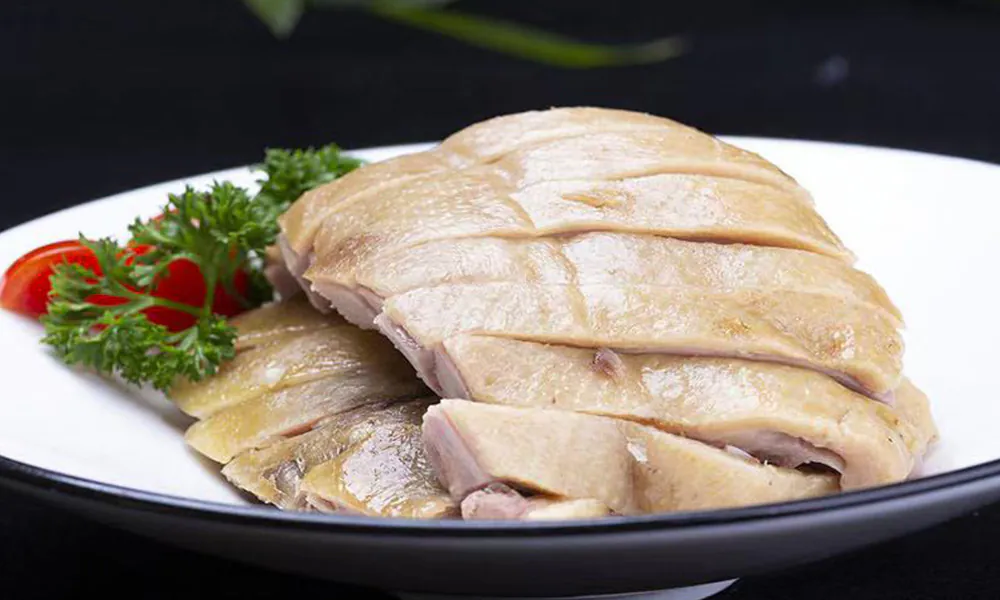 Tender plain boiled duck with fresh garnish at Gourmet Duck 绝味鸭霸王，a Chinese Restaurant in Chicago