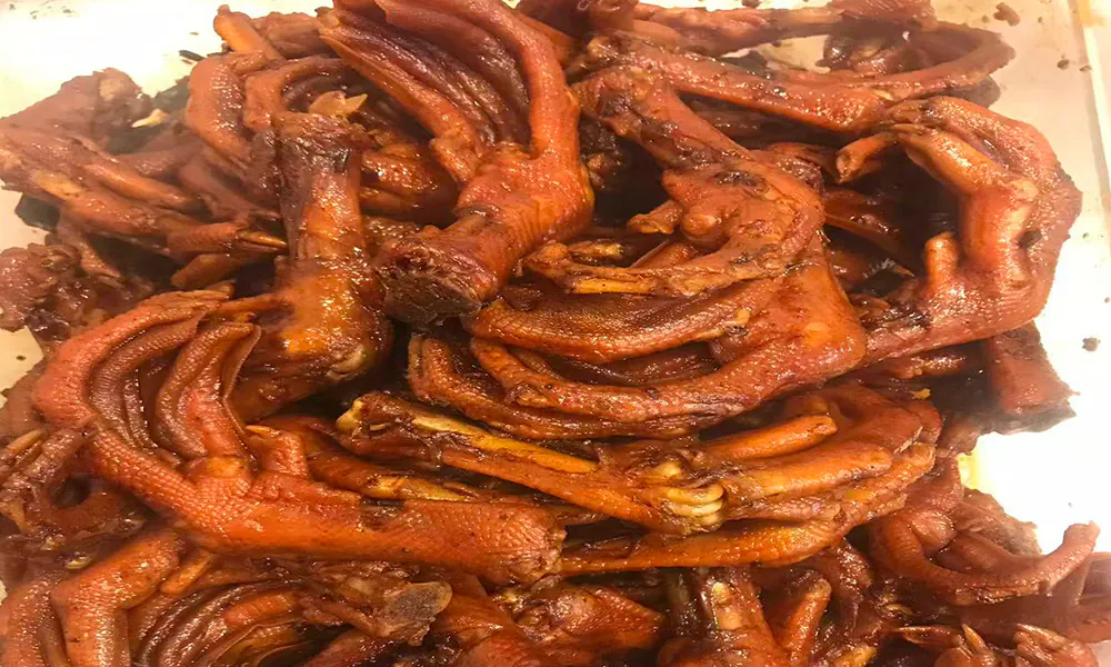 Tender spiced duck palms with savory flavor at Gourmet Duck 绝味鸭霸王，a Chinese Restaurant in Chicago