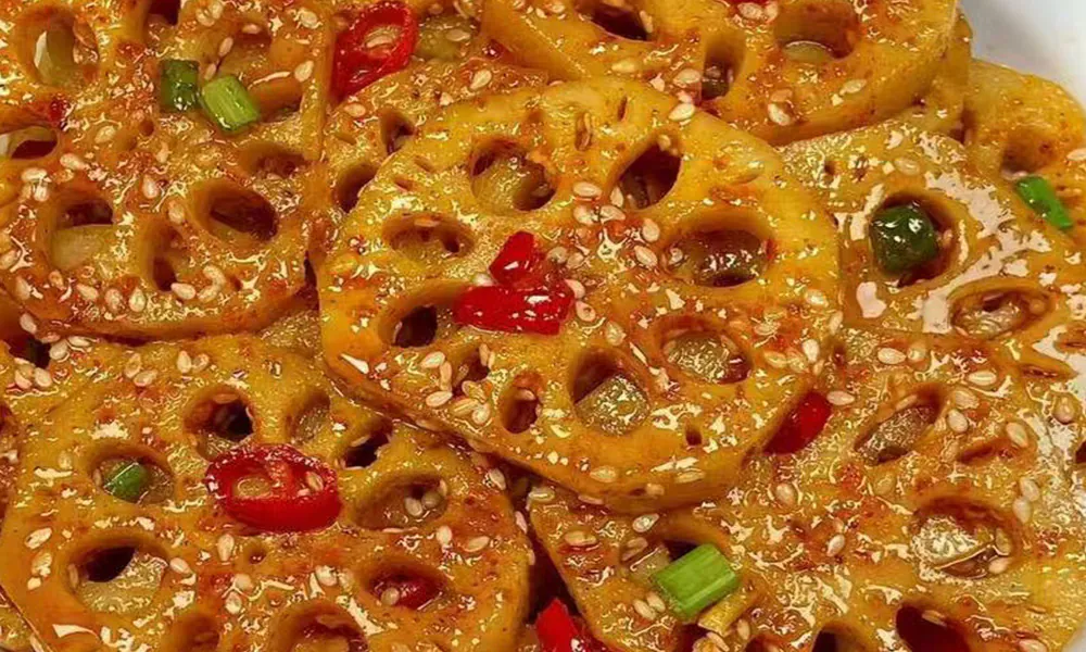 Spicy chilled lotus root slices with sesame at Gourmet Duck 绝味鸭霸王，a Chinese Restaurant in Chicago